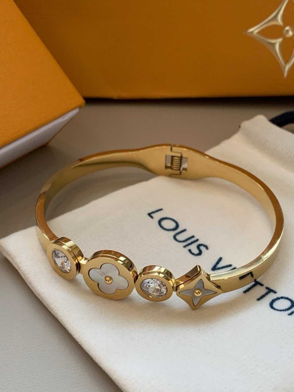 Louis Vuitton Gold-Tone Floral & Crystal Bangle with White Accents